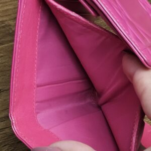 Bill compartment inside the pink leather wallet