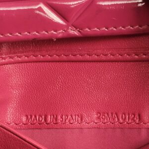 MADE IN SPAIN and 25MA0124 stamped inside the wallet
