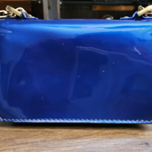 Reverse of the metallic blue patent J'Adior Mini