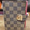 Louis Vuitton Damier Ebene Koala Small Ring Agenda Cover PM - front of the agenda with its gold-tone push-lock