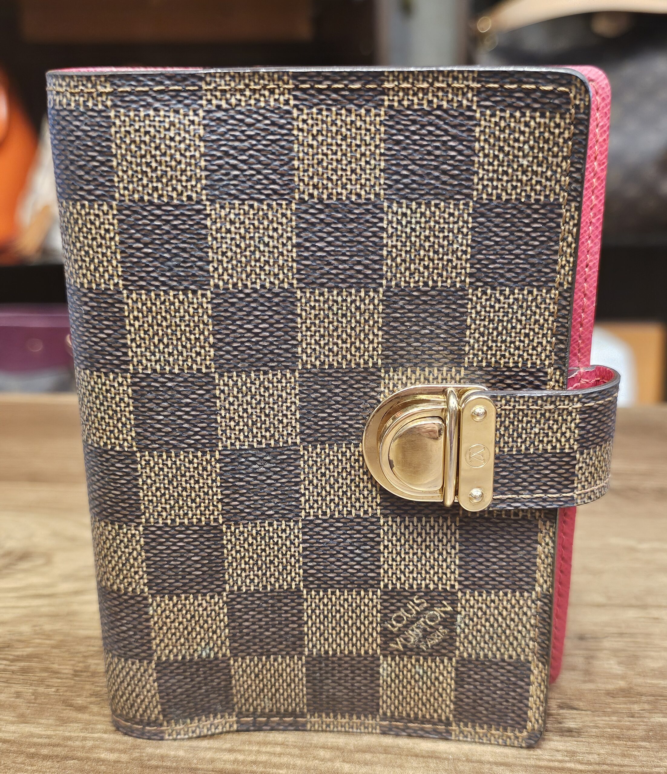 Louis Vuitton Damier Ebene Koala Small Ring Agenda Cover PM - front of the agenda with its gold-tone push-lock