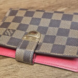 Koala agenda cover lying flat with the red interior edge showing