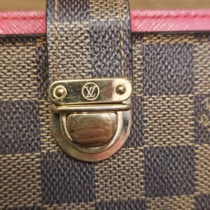 Gold-tone Koala push-lock closure with the LV logo