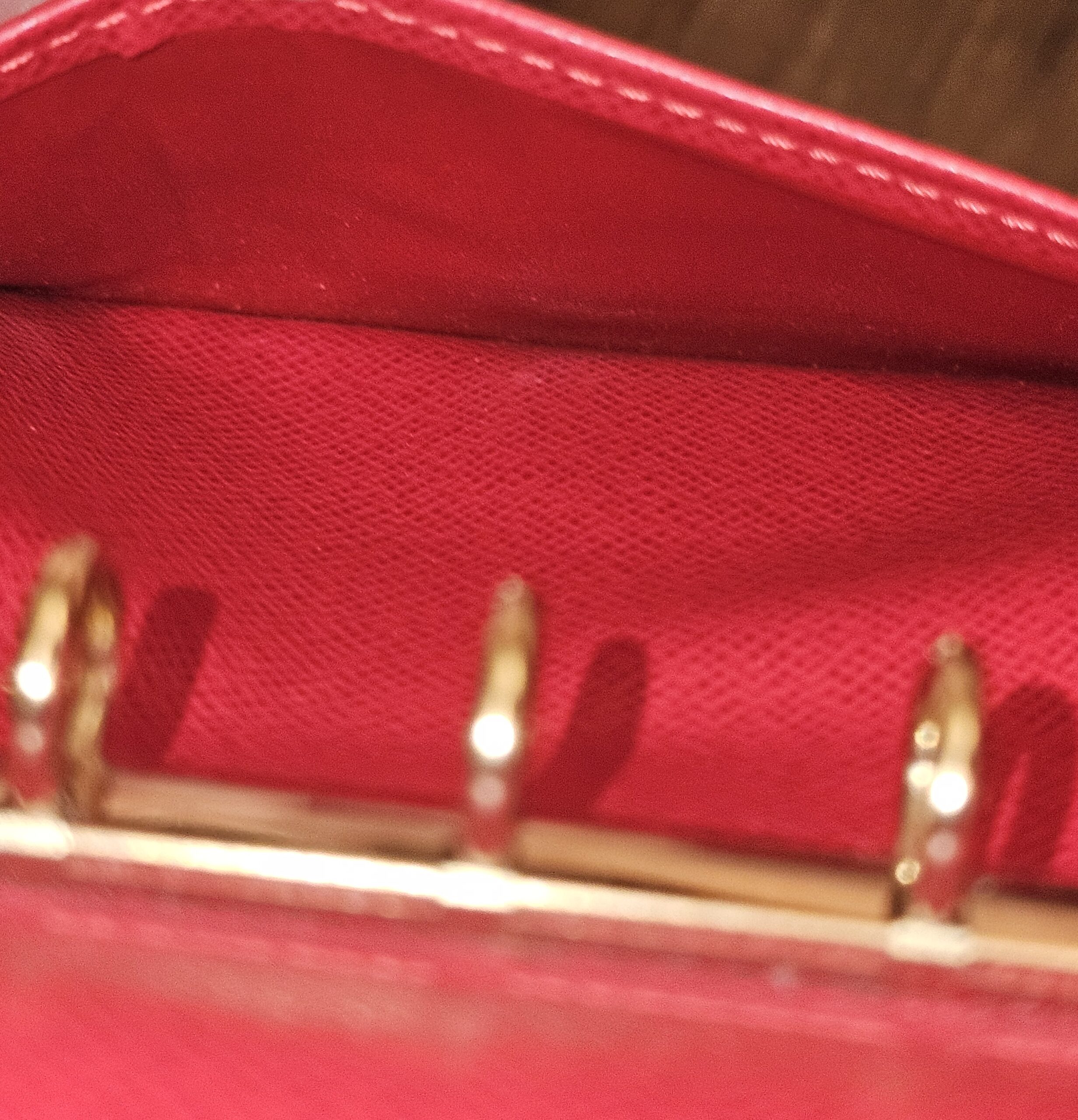 Close-up of the gold-tone agenda rings