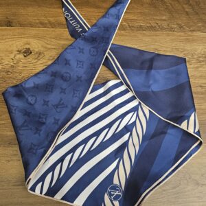 Louis Vuitton Silk Monogram Nautical Scarf Navy Blue - the scarf laid out showing the tonal Monogram and rope stripes