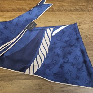 Folded scarf showing the cream and navy rope stripe band