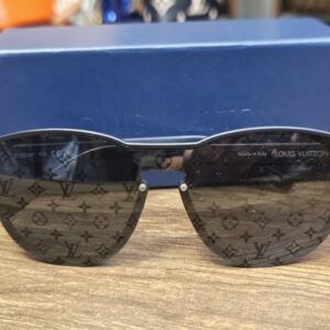 Louis Vuitton Z1333W Waimea Monogram Sunglasses Black - front view on the blue Louis Vuitton box