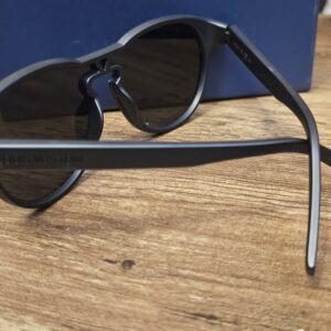 Matte black Waimea sunglasses at an angle