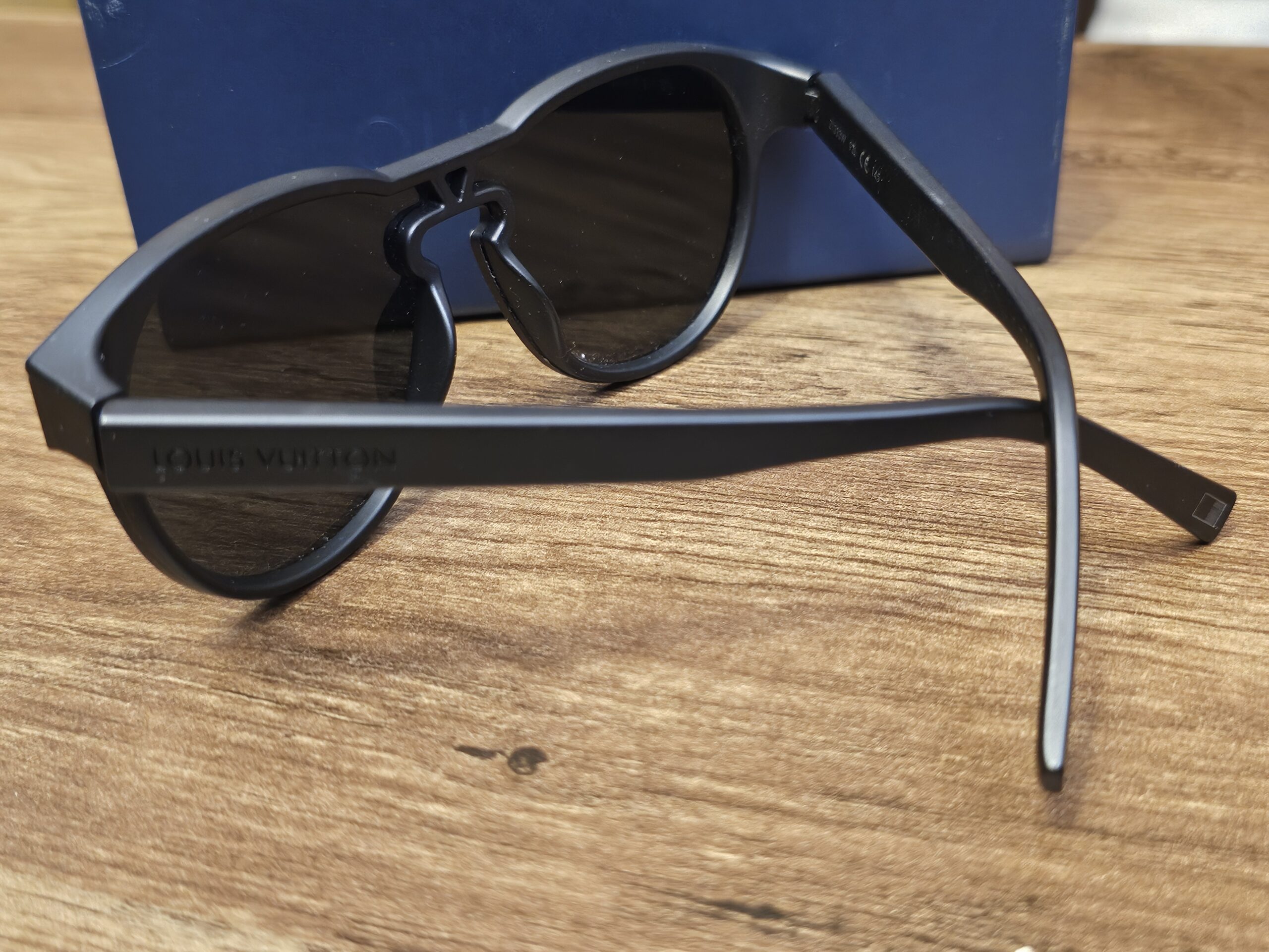 Matte black Waimea sunglasses at an angle