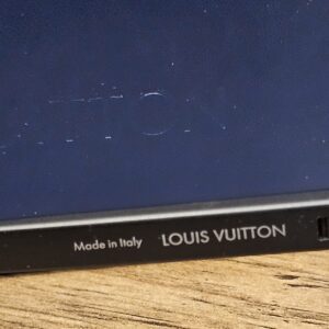 Made in Italy and LOUIS VUITTON printed inside the temple