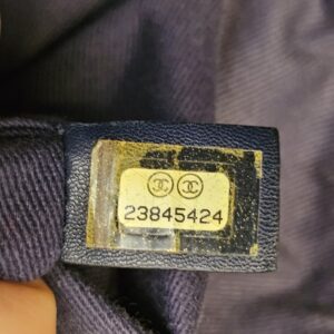 Chanel serial sticker inside the Deauville tote reading 23845424