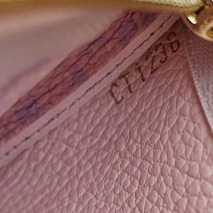 Production code embossed inside the Sweet Lavender Empreinte key pouch