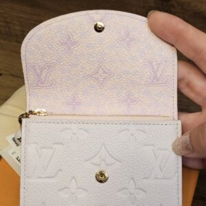 Rosalie coin purse opened to show the card slots and flat pocket