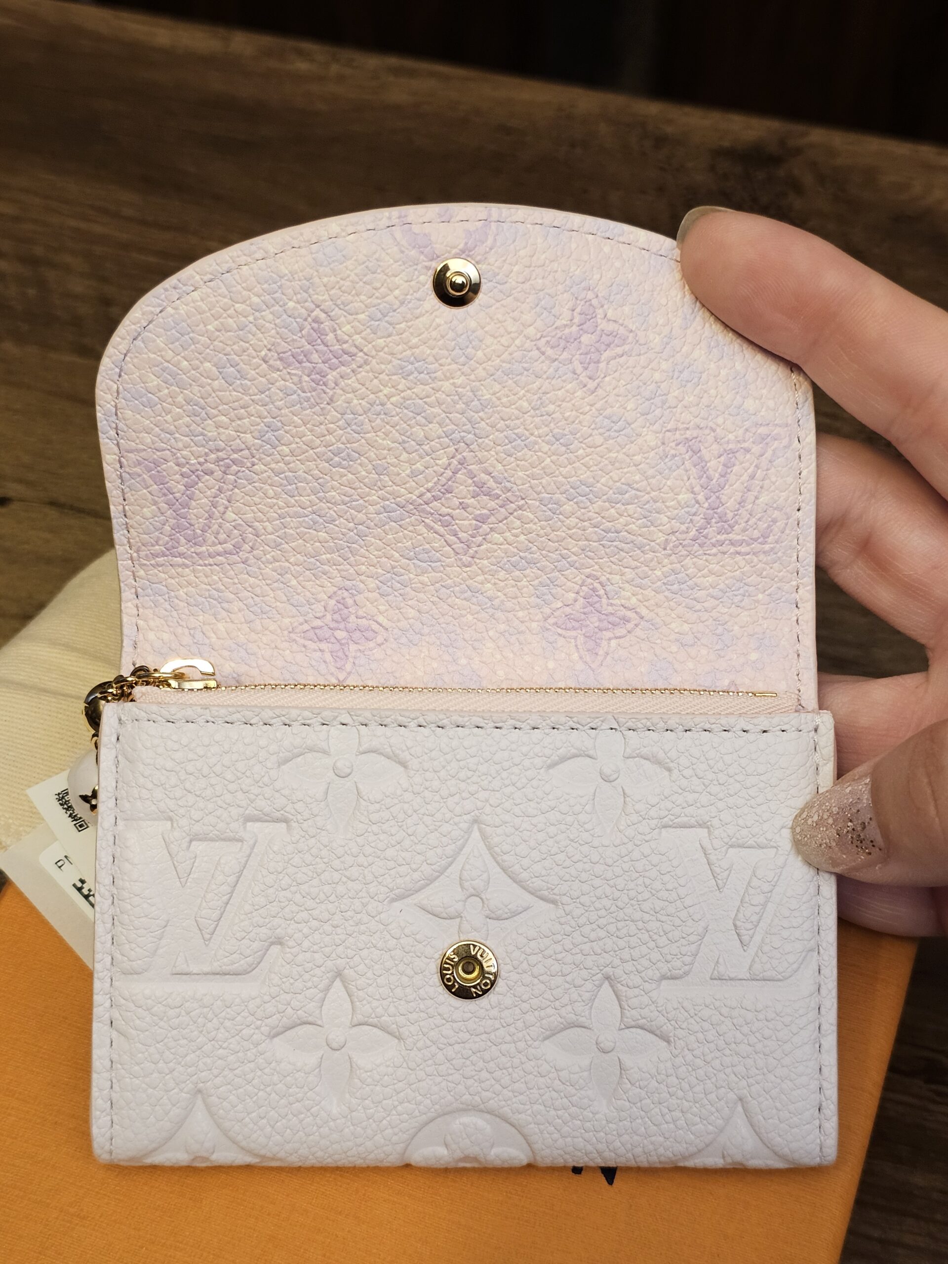 Rosalie coin purse opened to show the card slots and flat pocket