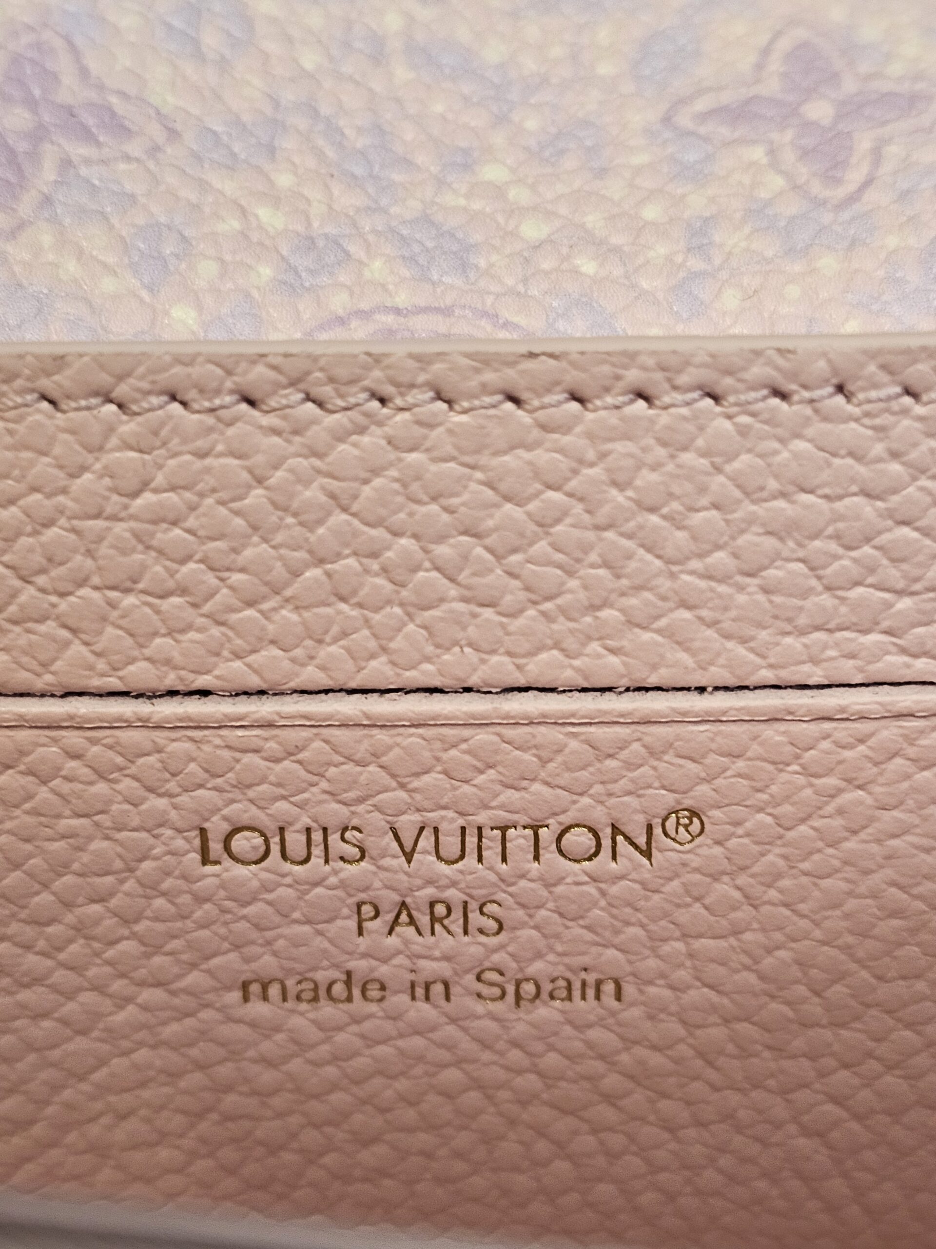 Heat stamp inside the Rosalie reading Louis Vuitton Paris made in Spain