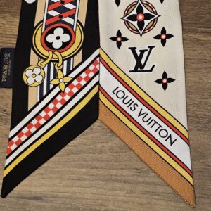 End of the bandeau with the Louis Vuitton banner, checkerboard and Monogram flower