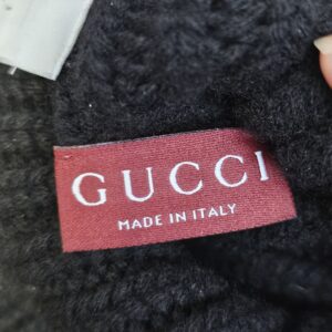 Red Gucci Made in Italy label sewn inside the beanie