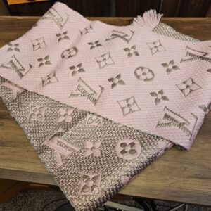 Logomania Shine scarf showing the pink face and the contrasting metallic woven reverse