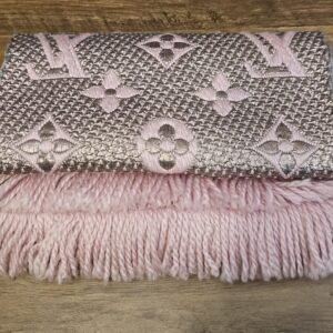 Folded Logomania Shine scarf showing the metallic reverse and pink fringe
