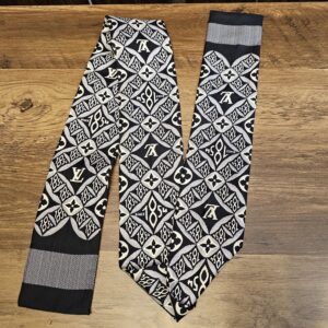Since 1854 silk bandeau laid out to show the full black, cream and gray pattern