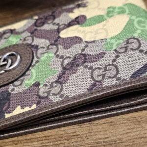 Reverse of the Gucci camouflage bifold wallet with brown leather trim
