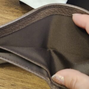 Interior lining of the Gucci bifold wallet held open