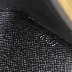 Close up of the date code RA3177 stamped inside the Smart Wallet