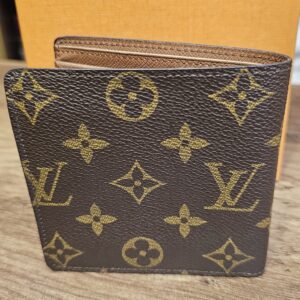 Vintage Monogram canvas bifold wallet standing closed