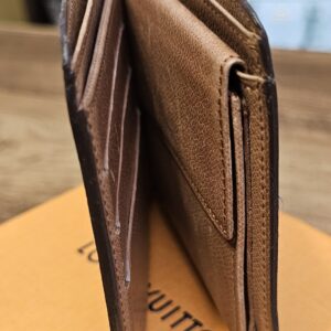 Side profile of the open Monogram bifold wallet
