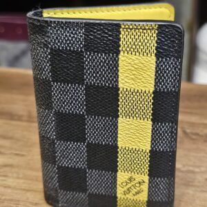Louis Vuitton Damier Graphite Pocket Organizer Yellow Limited Edition closed, showing the yellow stripe on Damier Graphite canvas