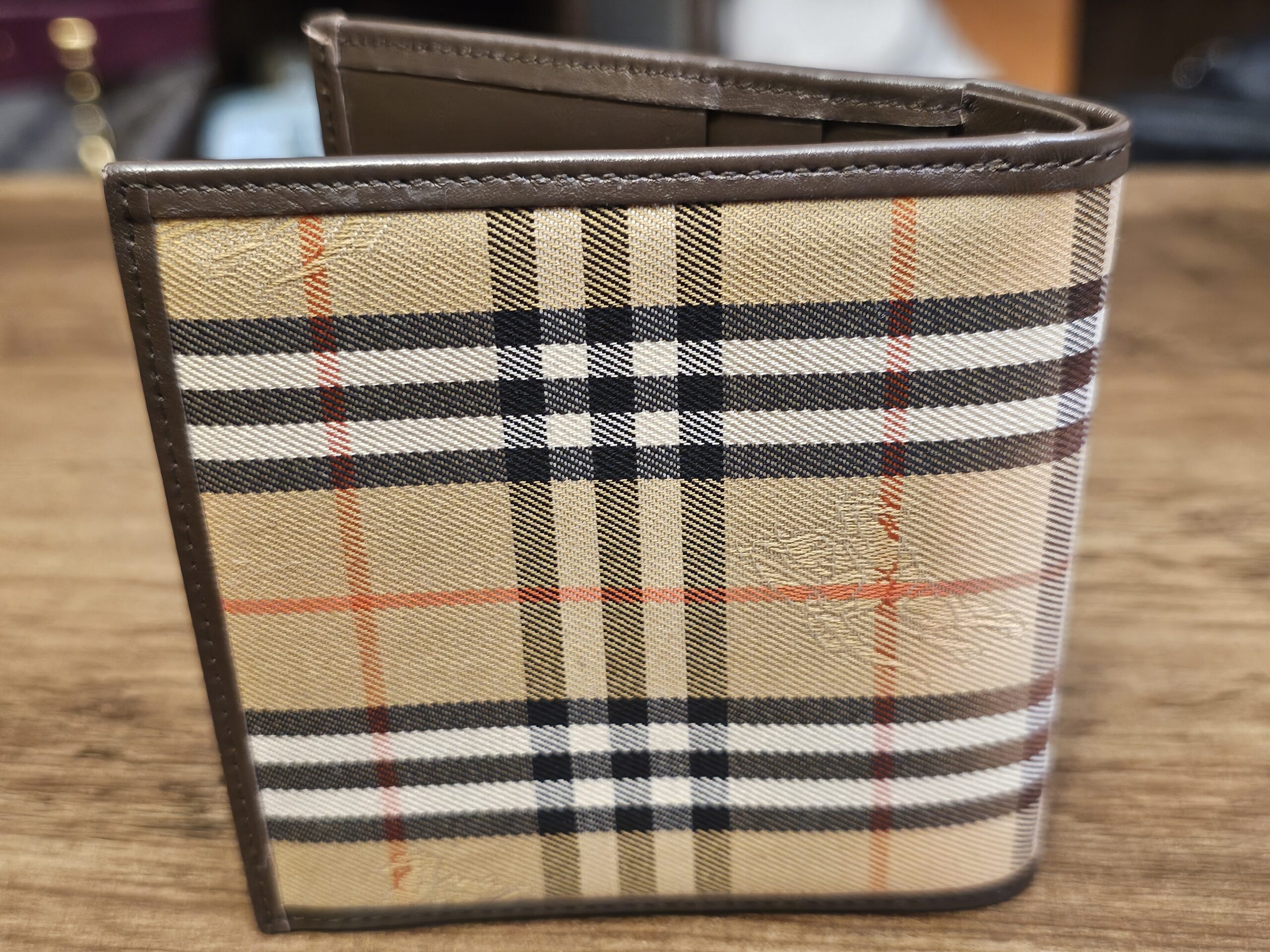 Back of the Burberrys bifold wallet showing the Nova Check pattern