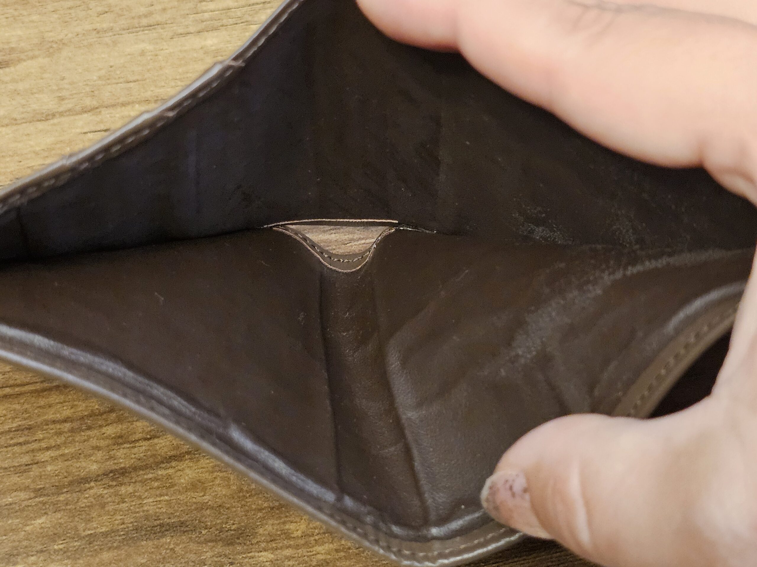 Bill compartment of the Burberrys wallet held open