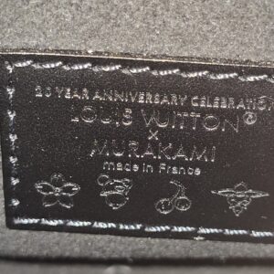 Interior plaque reading 20 Year Anniversary Celebration Louis Vuitton x Murakami made in France