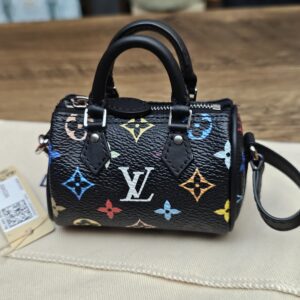 Front view with the black strap and retail tag