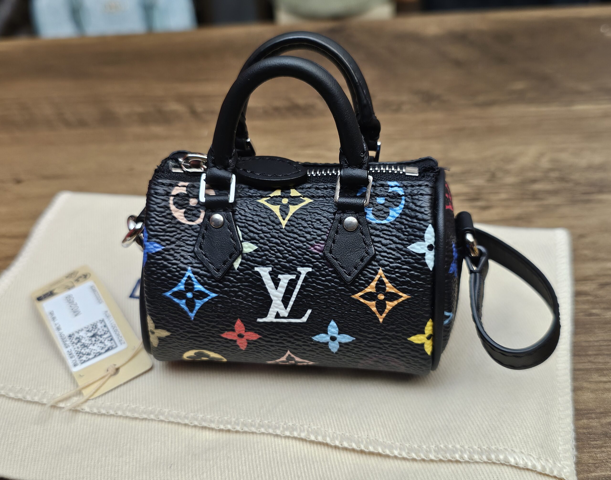 Front view with the black strap and retail tag