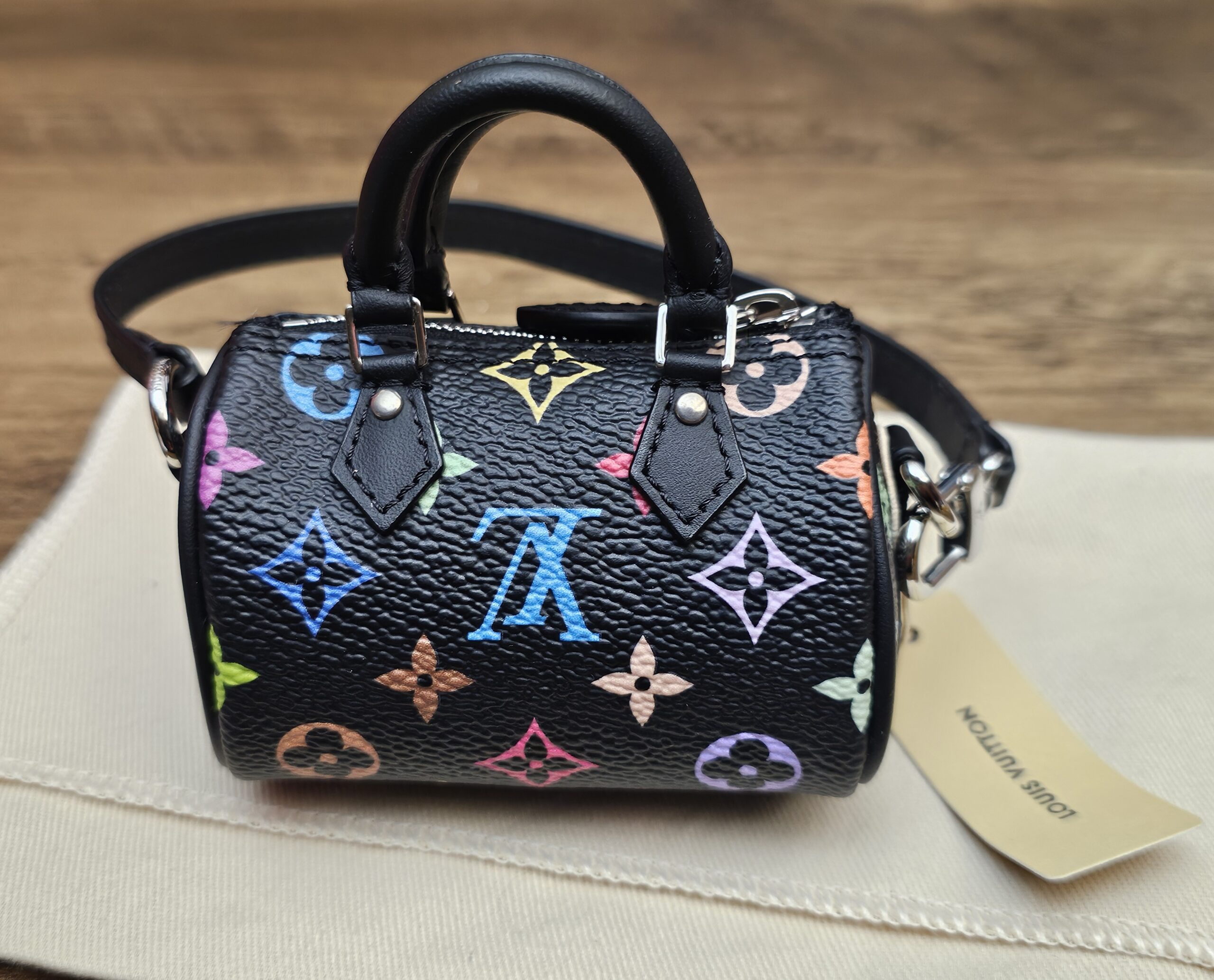 Straight front view of the black multicolor monogram