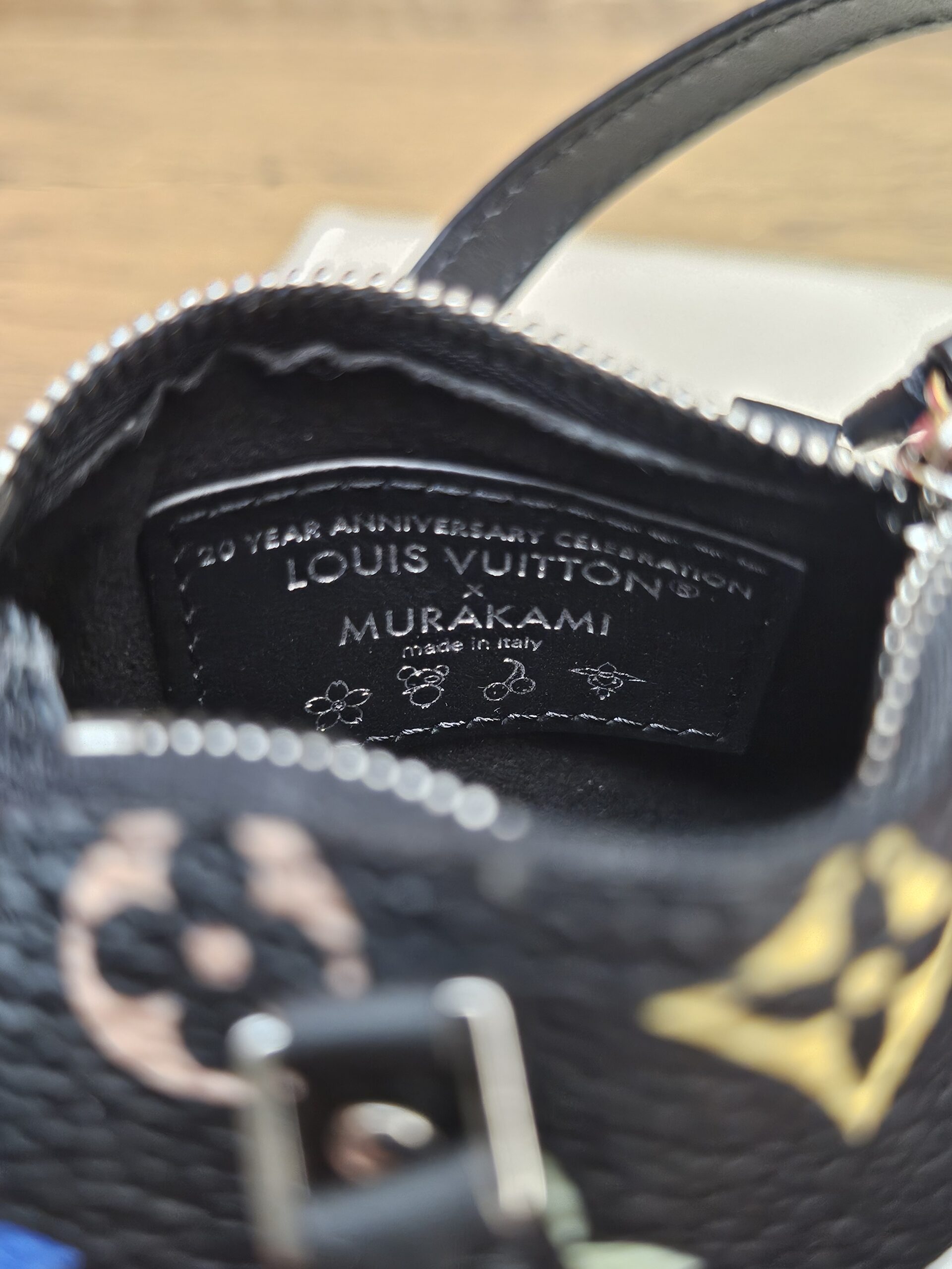 Interior plaque reading 20 Year Anniversary Celebration x Murakami made in Italy