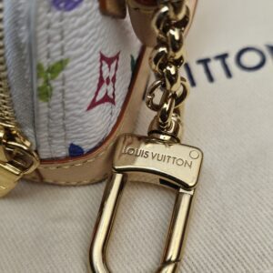 Close up of the engraved gold-tone clasp
