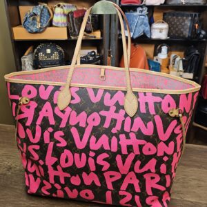 Back view of the fuchsia graffiti on Monogram canvas