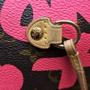 Close up of the side lace grommet and vachetta tab
