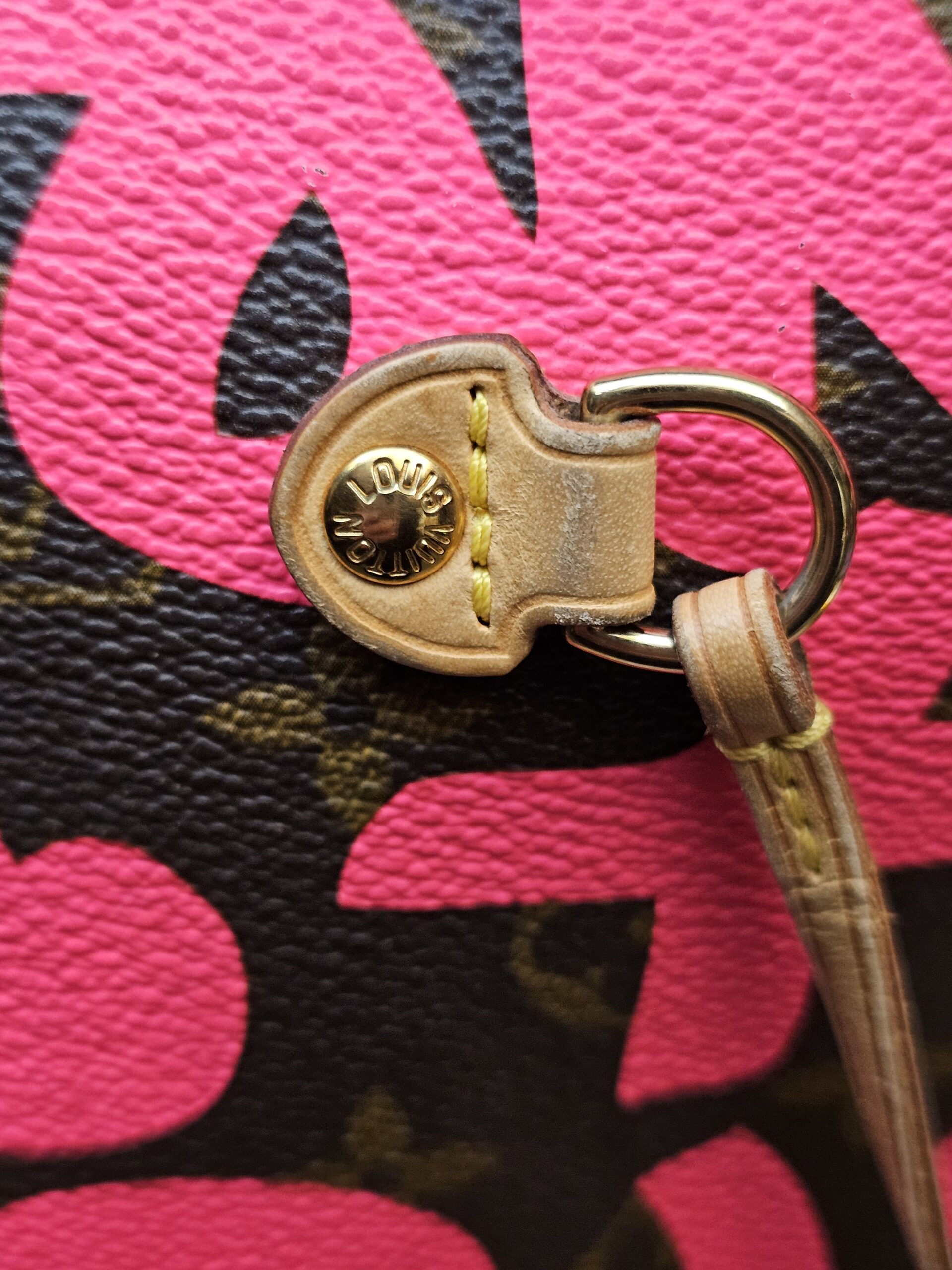 Close up of the side lace grommet and vachetta tab