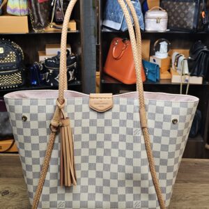 Front view with the tassel hanging from the braided handle