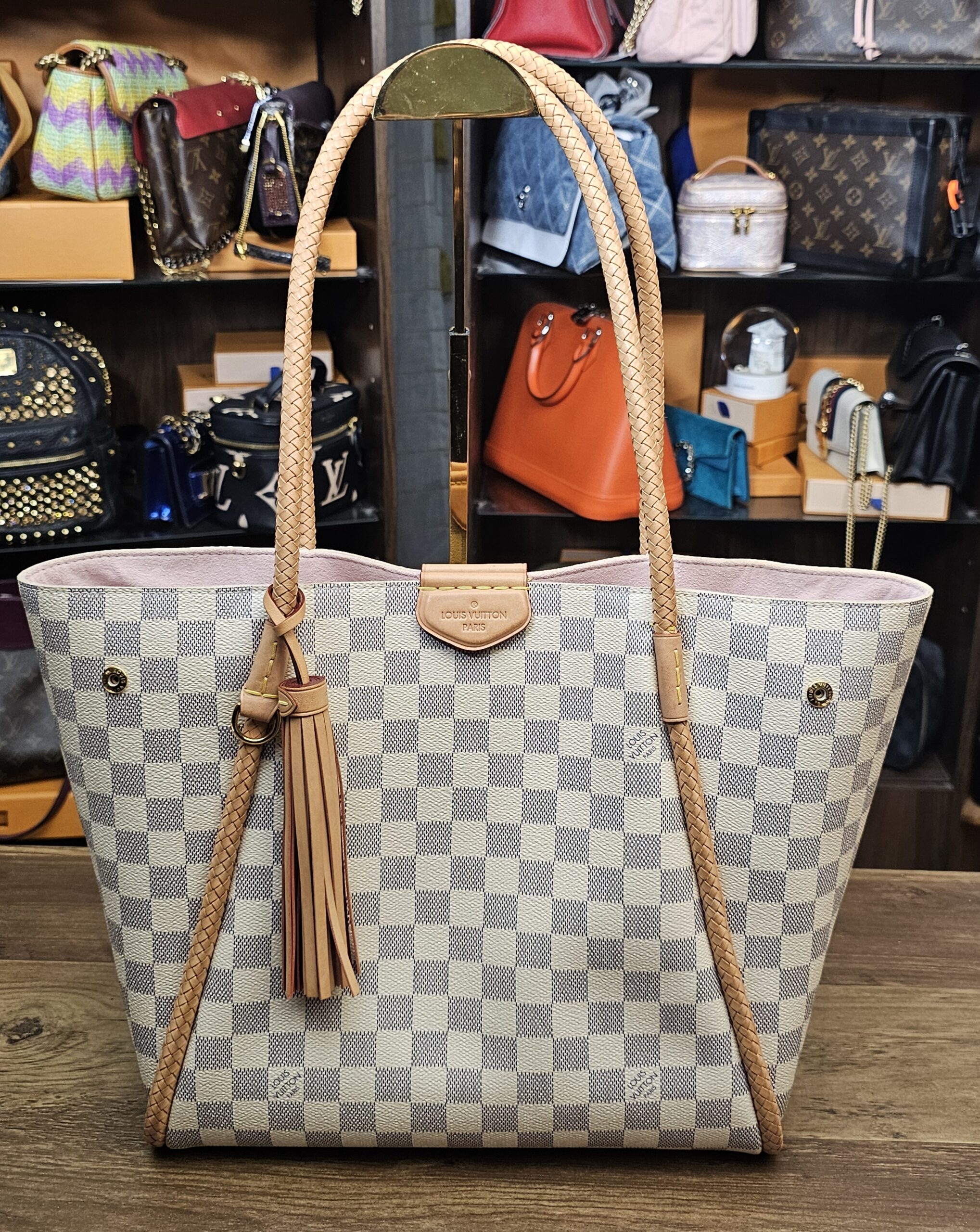 Front view with the tassel hanging from the braided handle