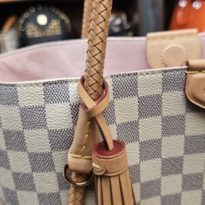 Close up of the leather tassel and handle attachment
