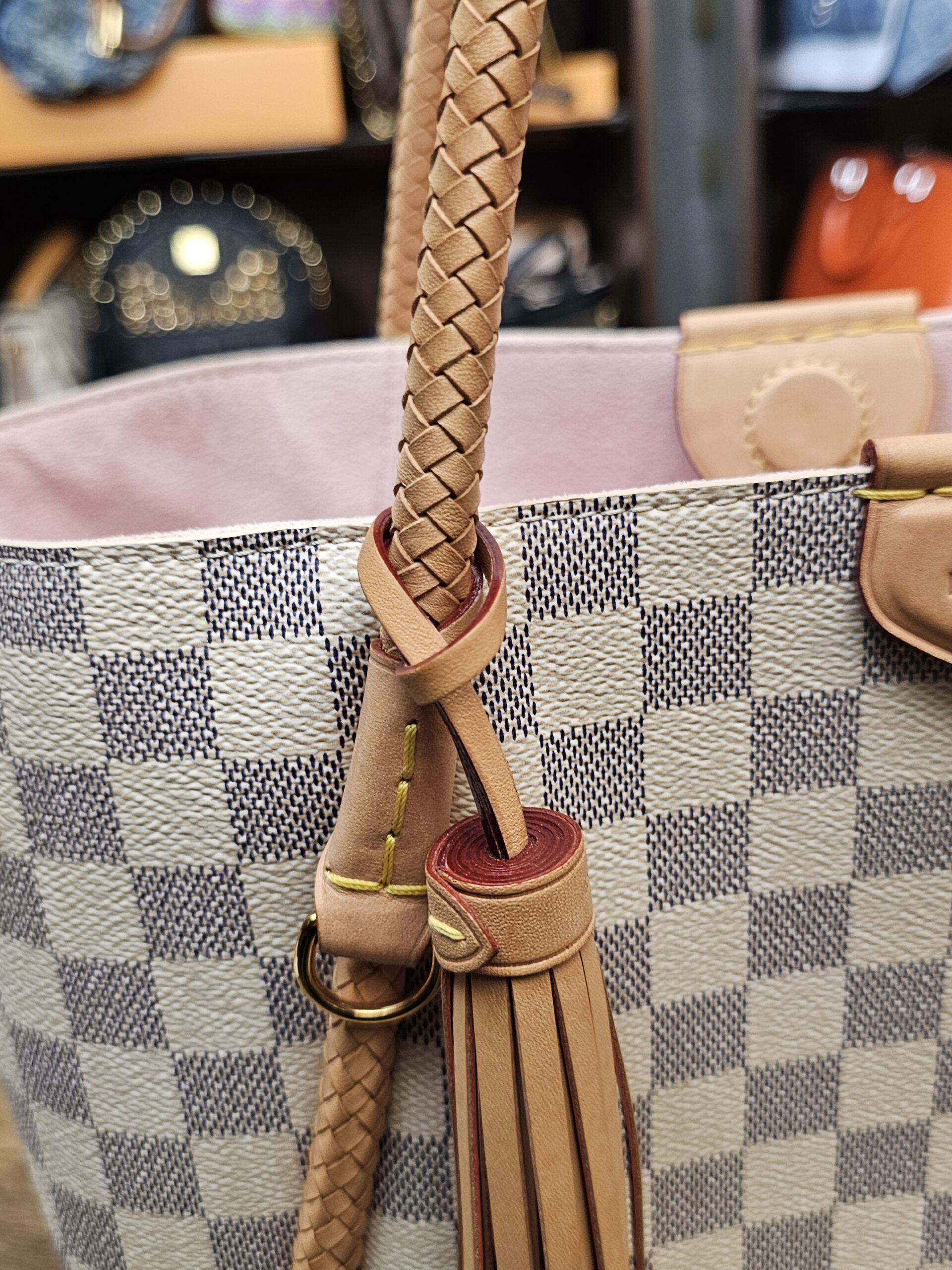 Close up of the leather tassel and handle attachment