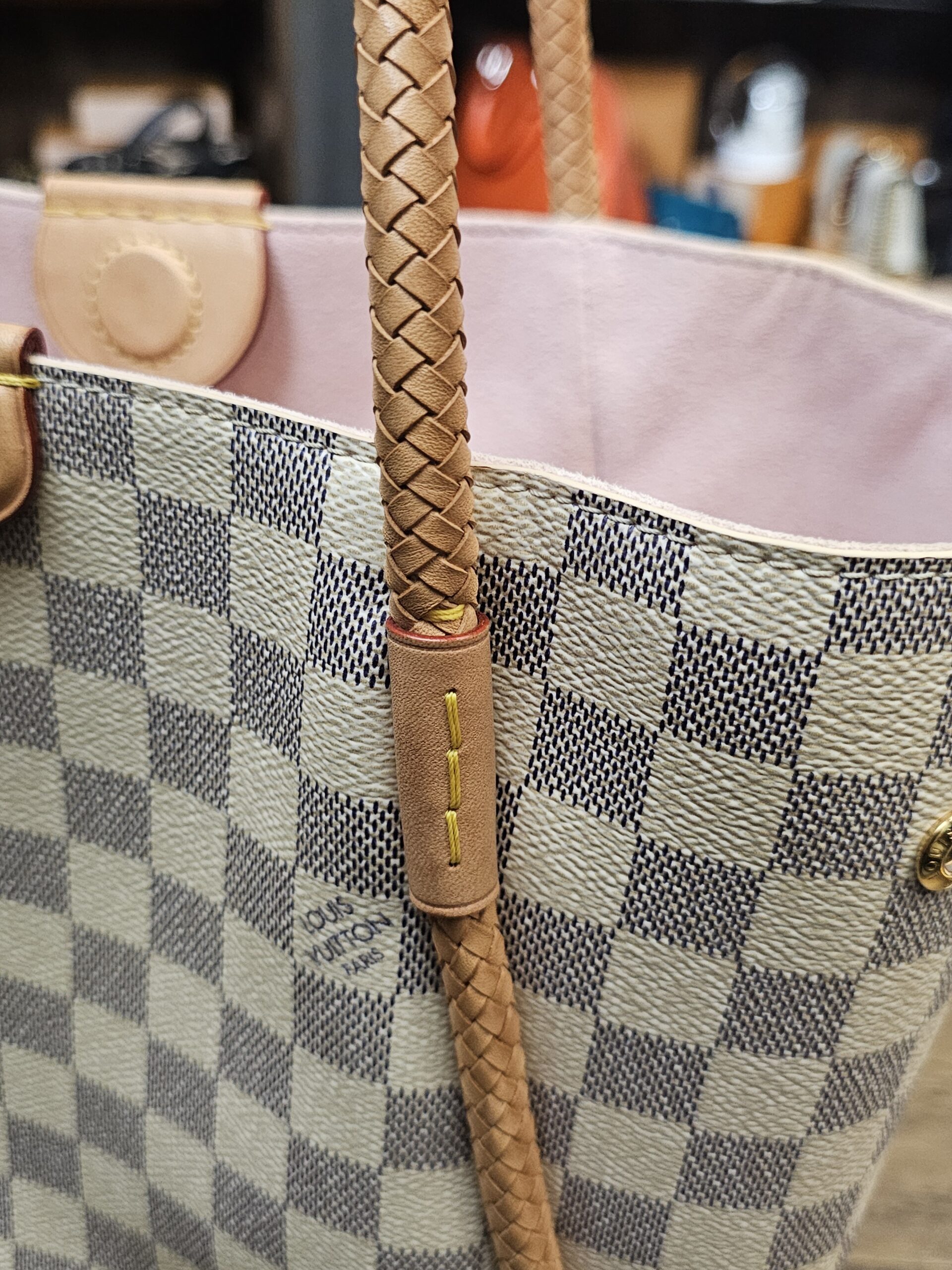 Close up of the braided handle and trim showing honey patina