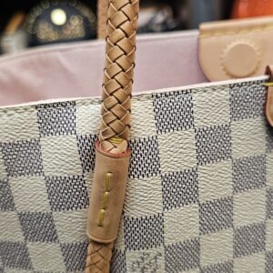Close up of the handle base and vachetta