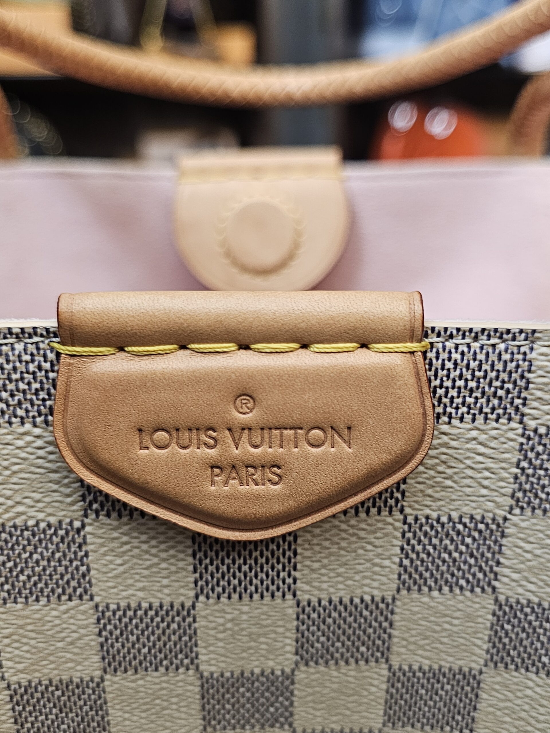 Heat stamp on the vachetta tab