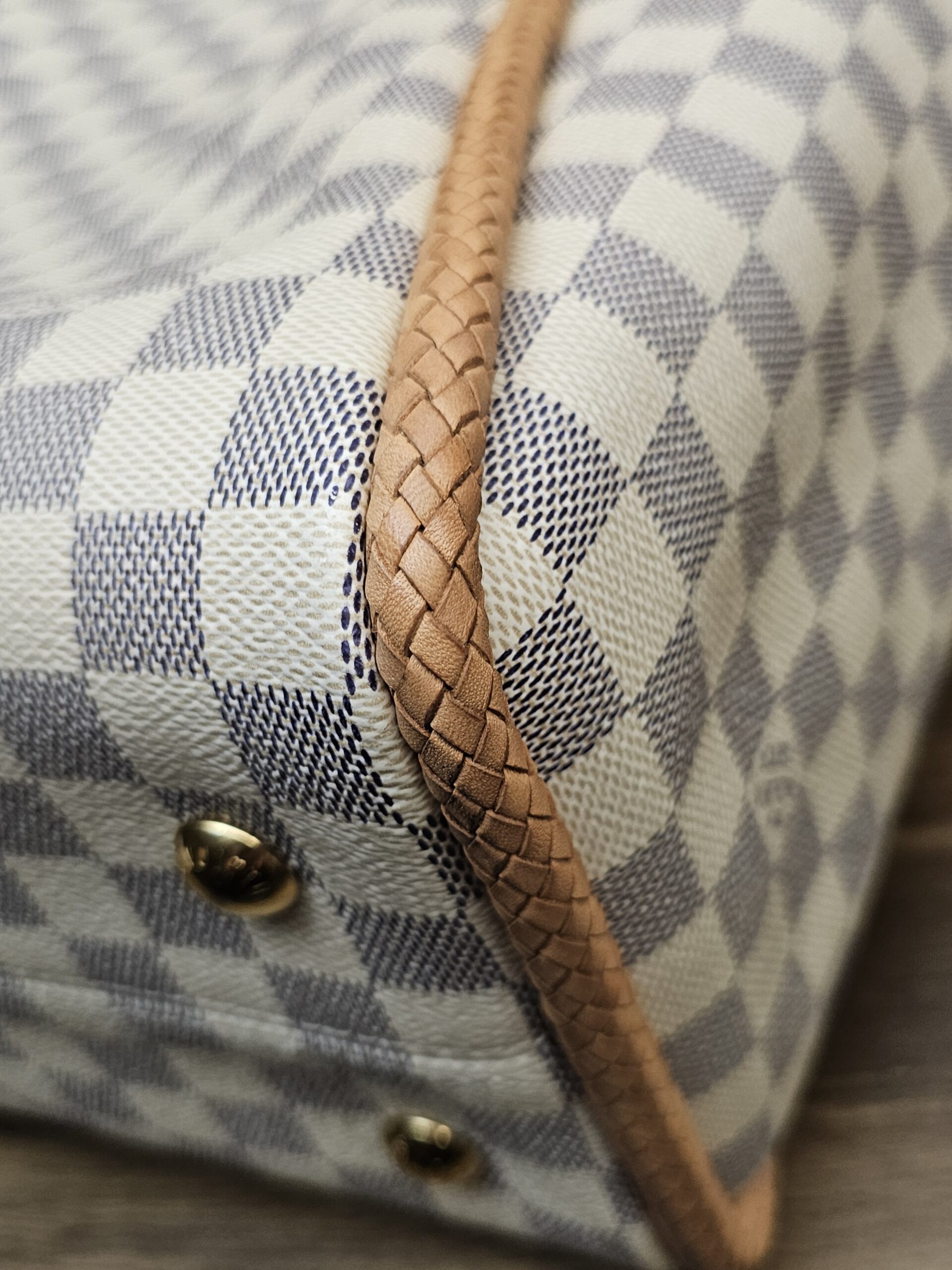 Close up of a base corner and braided trim