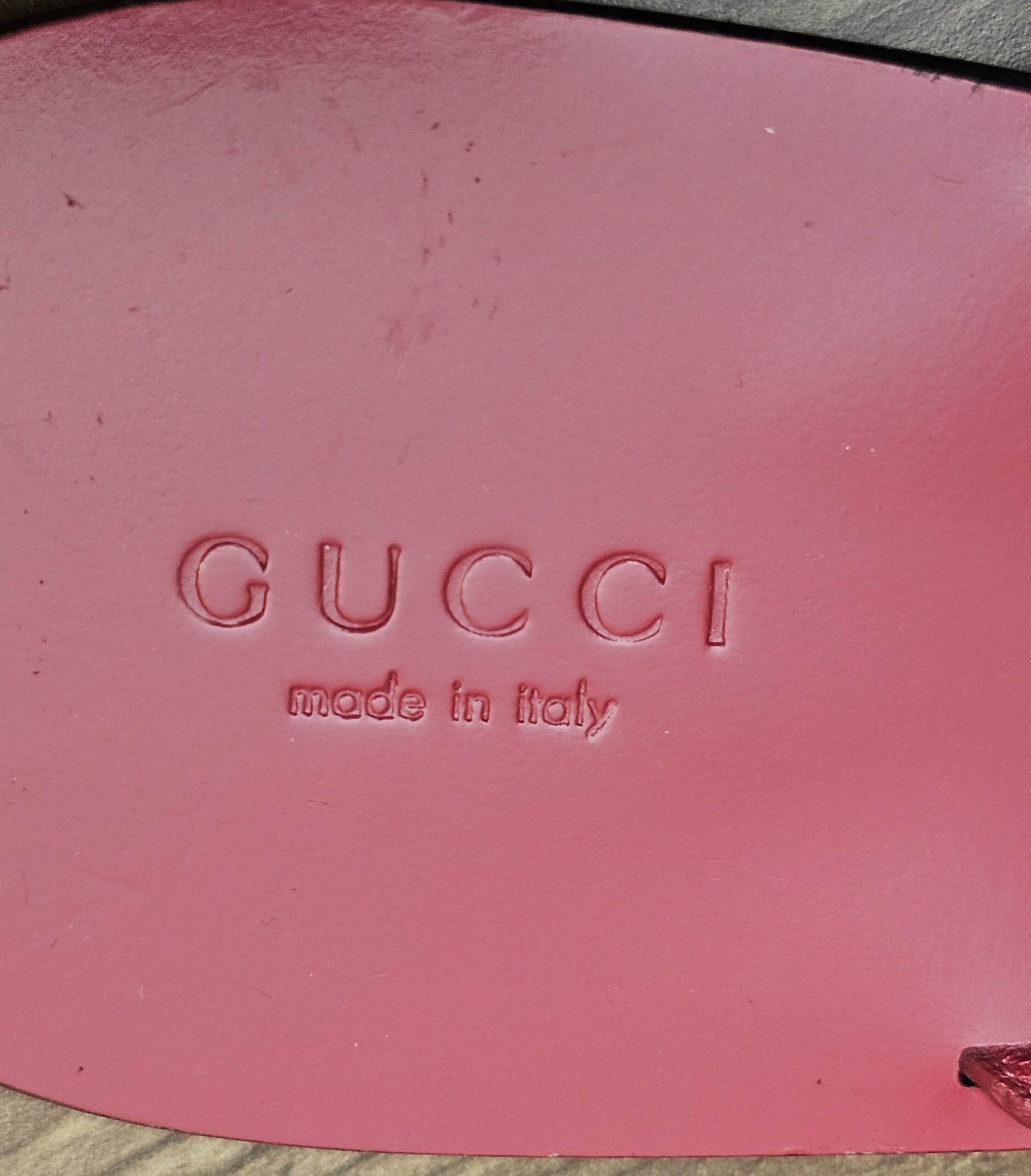 Close up of the logo and made in Italy stamp on the insole